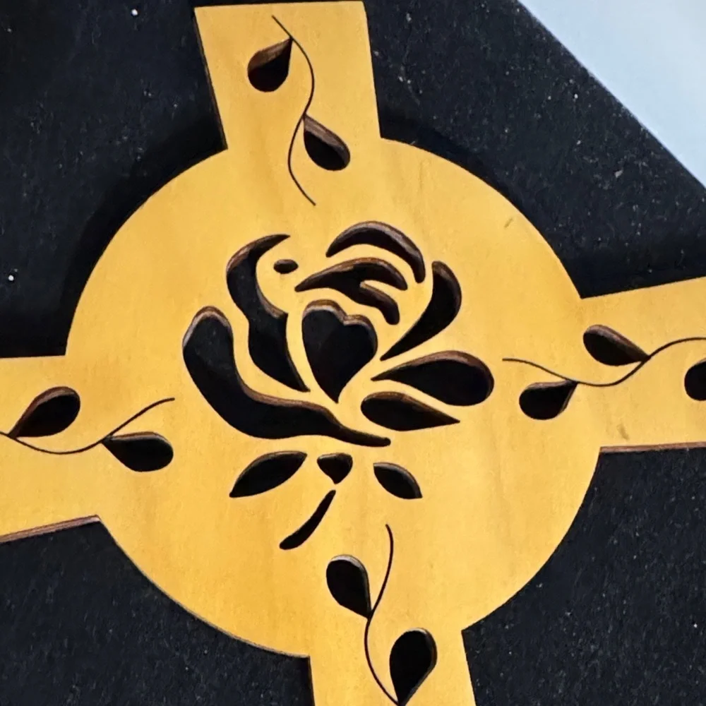 Wooden Celtic cross with a rose and vine cut-out design